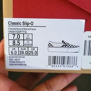 Vans Slip on with platform checkers Women's size 8.5